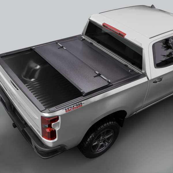 Chevy Silverado/GMC Sierra 2500/3500 HD New Body Style (2020-2025) - Low Profile Hard Folding Truck Bed Tonneau Cover - 6.9FT Bed (82.2